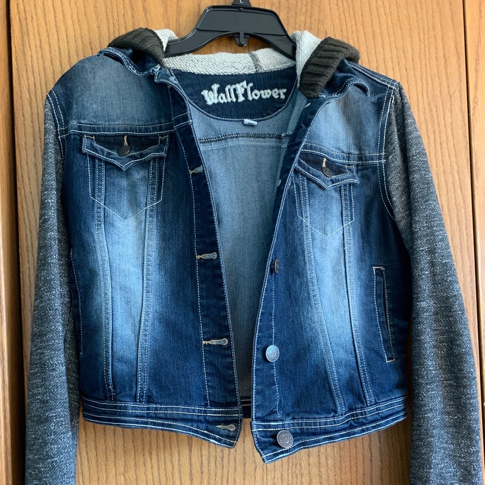 dark wash denim jacket with sweater sleeves